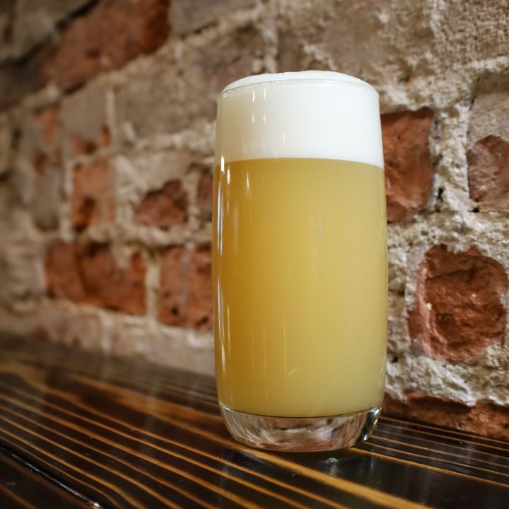 An image of Low New, a New England IPA brewed by BriarBrothers Brewing Company in Buffalo, NY.